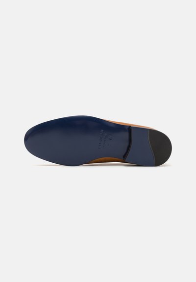 Brown leather shoe sole with a dark blue outer edge. Features a smooth texture and a gently curved shape, with embossed sizing details.