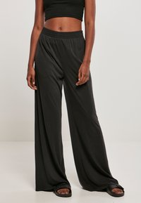 Urban Classics - LADIES MODAL WIDE LEG PANTS - Tygbyxor - black Miniatyrbild 1