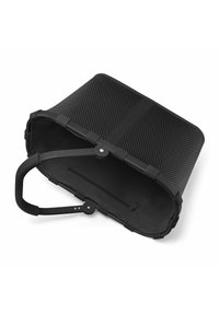 Schwarze Netz-Tasche mit offenem Oberteil, gebogenem Griff und einem Reißverschlussfach innen. Texturierte Oberfläche und verstärkte Kanten.