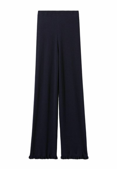 Pantalones de pierna ancha en tela de un azul marino oscuro. Textura acanalada, cintura elástica y detalles de volante en los puños. Material suave y transpirable.