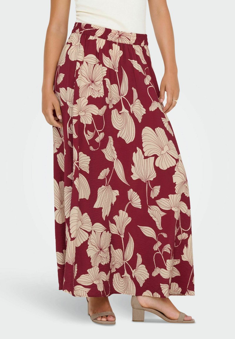 Jupe maxi bordeaux avec motif floral crème, dotée d'une taille élastique et d'une silhouette fluide, fabriquée en tissu léger.