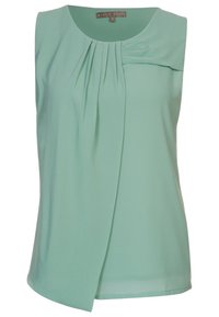 Un top senza maniche di un leggero verde menta realizzato in un tessuto morbido, caratterizzato da pieghe drappeggiate e un design frontale sagomato per un aspetto aderente.
