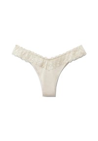 Crème-kleurige damestong met een bloemenkant tailleband op een witte achtergrond.