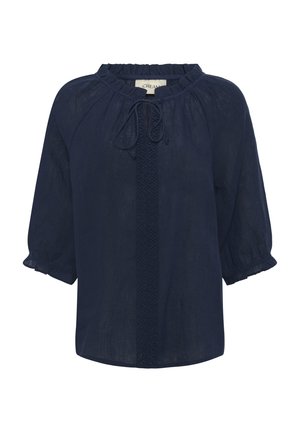 Blusa in lino blu navy con scollatura arricciata, chiusura a fiocco e dettagli ricamati lungo il centro; presenta maniche puff a tre quarti.