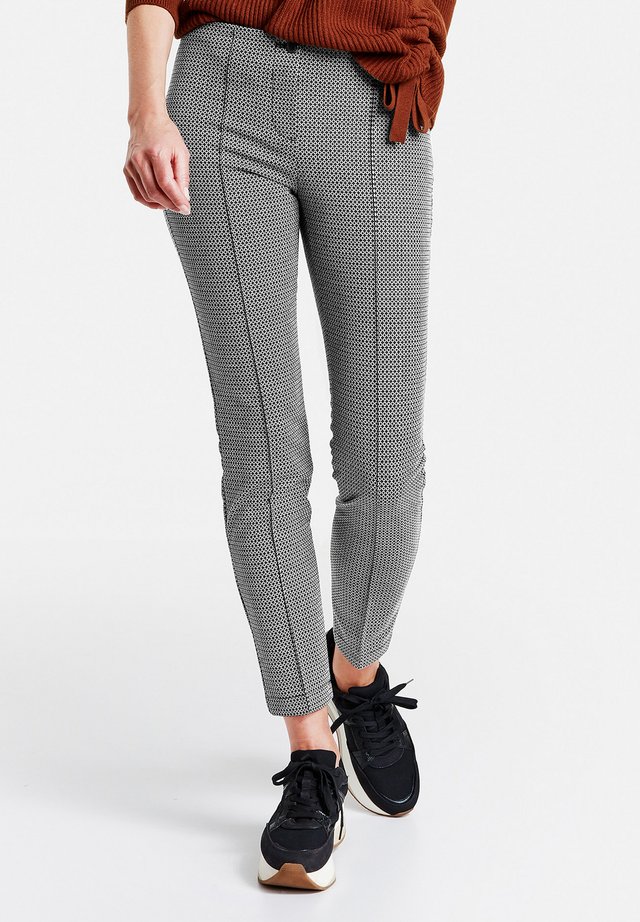 Pantalon classique - schwarz/weiß