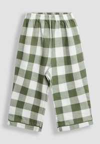 Vihreät ja valkoiset ruudulliset pyjamahousut, joissa on joustava vyötärö, lyhyt pituus, pehmeä kangas ja käännetty helma rentoa istuvuutta varten.