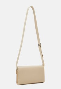 Karl Kani RETRO - Ledvinka - taupe