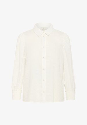 Fehér, texturált anyagból készült gombos ing. Klasszikus gallérral, hosszú ujjal, ráncolt mandzsettával és karcsúsított szabással.