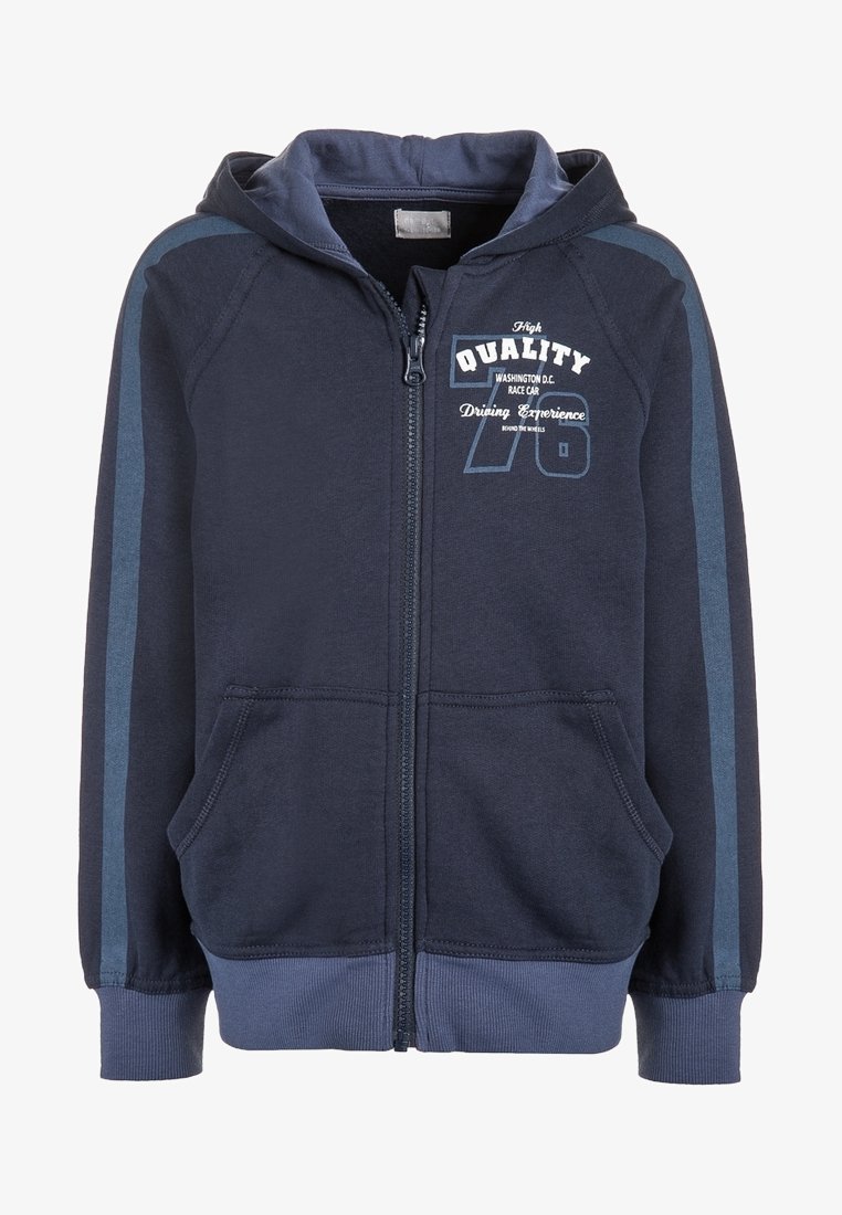 Hoodie zippé marine avec poches avant, rayures latérales contrastées et graphiques en texte blanc. Fabriqué en tissu doux, adapté à un usage décontracté.