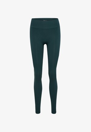 Ciemnoniebieskie legginsy o dopasowanym kroju, wysokim prążkowanym pasie i gładkiej fakturze. Idealne do aktywności fizycznej lub na co dzień.