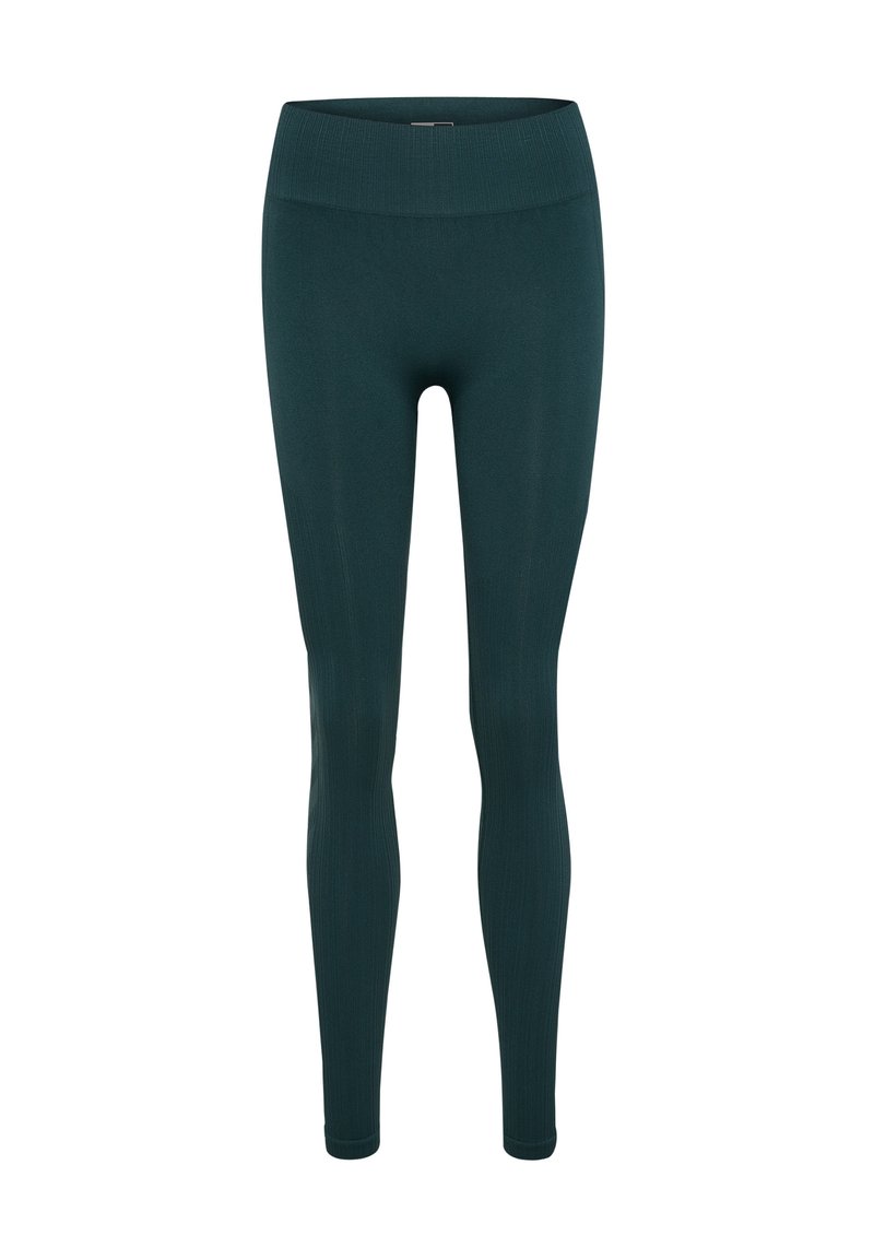 Mörk teal leggings med en figurnära design, hög ribbad midja och slät textur. Perfekta för aktivt eller avslappnat bruk.