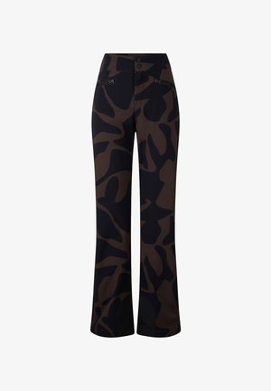 Pantalons à motif camouflage en marron foncé et noir, fabriqués en matériau extensible, avec une taille haute et deux poches zippées.