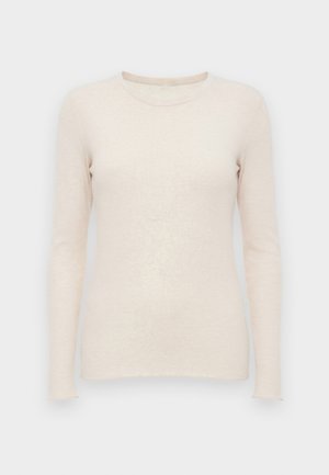 Lys beige langermet genser med ribbestruktur, rund hals og tettsittende design. Myk stoff og sømløse mansjetter.