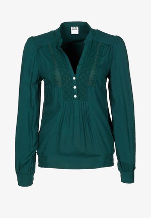 Donkergroene blouse met lange mouwen met kanten inzetstukken, drie witte knopen, geplooide stof onder de knopen en elastische manchetten en zoom.