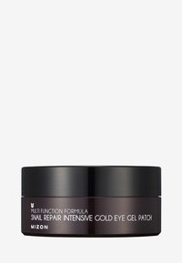 Conteneur noir rond avec une finition brillante, présentant un texte blanc indiquant "Masque pour les yeux au collagène intensif à l'or pour le soin des cernes" et des informations produit.