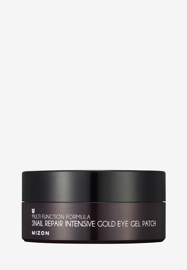 Conteneur noir rond avec une finition brillante, présentant un texte blanc indiquant "Masque pour les yeux au collagène intensif à l'or pour le soin des cernes" et des informations produit.