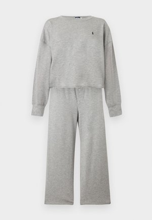 Light gray long-sleeve sweatshirt and matching wide-leg pants with button closure, featuring a small dark logo on the upper left chest.