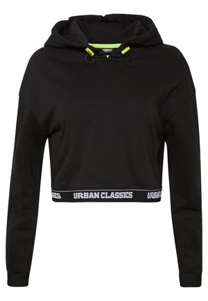 Zwarte cropped hoodie van zachte stof, met een capuchon met trekkoord en groene accenten, en een witte logo band langs de zoom.