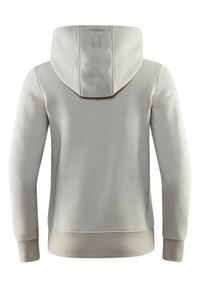 Ljusgrå hoodie med en rymlig huva, ribbade muddar och fåll. Baksidan har en diskret logodetalj broderad nära huvan. Slät textur.