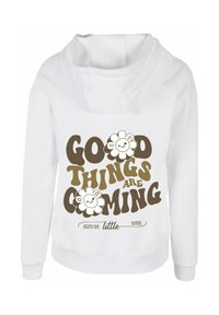 Hvit hettegenser med stor brun tekst som sier "GODE TING KOMMER", prydet med tegneserie-løvegrafikk og tekstdetaljer.