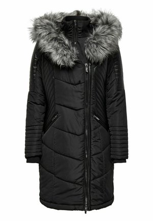 Manteau noir matelassé avec capuche grise en fausse fourrure amovible. Il présente un design matelassé diagonal, deux poches zippées et des poignets en tricot côtelé.