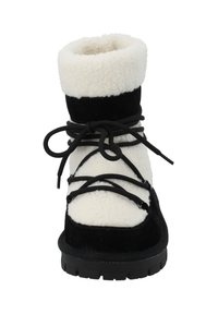 Botas de invierno en negro y crema con parte superior de lana de oveja suave, cuerpo de ante, puntera redonda y suela de goma gruesa con un diseño texturizado.