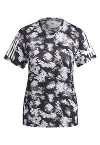 Camiseta deportiva de manga corta con un patrón floral en blanco y negro, que presenta un cuello redondo y tres rayas blancas en cada manga.
