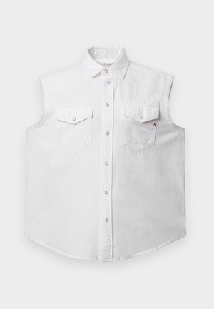 Fehér, ujjatlan, pamut denim ing, klasszikus gallérral, elöl gombos záródással, két mellzsebbel és diszkrét piros "R" hímzéssel.