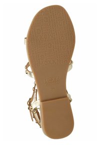 Sandaler med en beige gummisåle, gyldne metalstænger og dekorativt hardware. Præget mærkelogo på sålen. Størrelse 37.