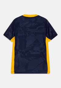 T-shirt med kort ärm för träning, främst marinblå med gula detaljer, med strukturerade mönster och rundad halsringning.