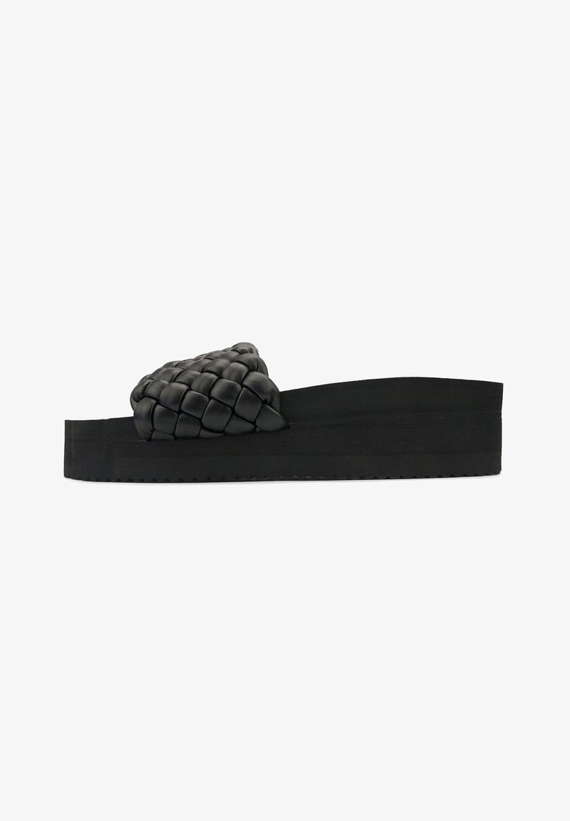 Black platform sandals with a woven upper, featuring a thick rubber sole and a smooth texture, designed for casual wear.