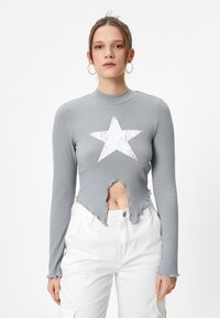 - Sweter