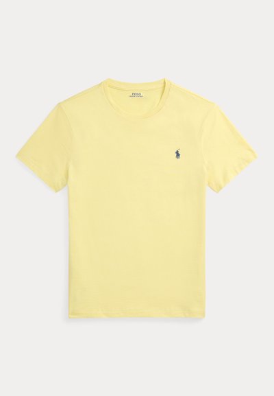 Rumeno majica kratkih rokavov z okroglim izrezom in majhnim temno modrim logotipom Polo Ralph Lauren na levi strani prsnega koša.