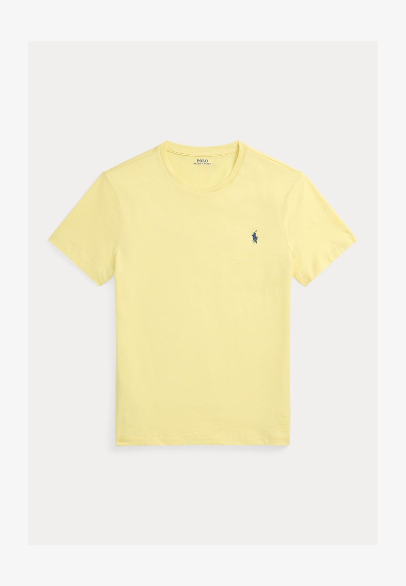Żółta koszulka z krótkim rękawem i okrągłym dekoltem z małym ciemnoniebieskim logo Polo Ralph Lauren na lewej piersi.