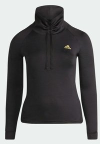 Haut de sport noir à manches longues avec col montant froncé et cordons, avec un petit logo doré Adidas sur le côté gauche de la poitrine.
