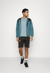 Mizuno ATHLETIC JACKET - Camisola com fecho - tapestry