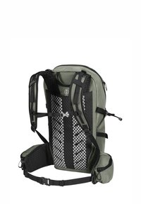 Green fabric backpack with black mesh back support, adjustable straps, and a zippered front pocket. Features a sturdy belt for support.