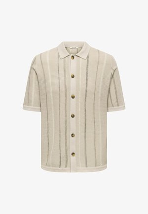 Polo beige a maniche corte in maglia con righe verticali strutturate e sei bottoni frontali.