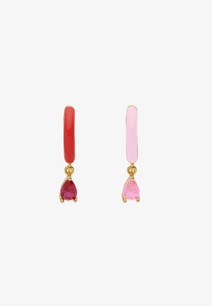 Huggie earrings with red and pink enamel bands, gold hardware, and pear-shaped dangling gemstones in matching colors.