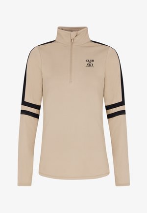 Bežani pulover sa zipom i visokim ovratnikom, crnim akcentnim prugama na rukavima i logom "CLUB de SKI" na prsima. Mekana, glatka tkanina.