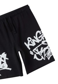 Costumi da bagno neri con vita elastica e cordoncino. Presentano testi bianchi audaci in stile graffiti e design astratti sui lati.
