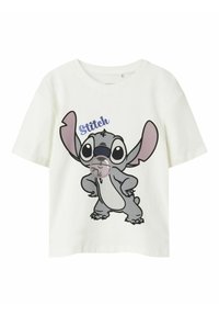 Hvid bomulds t-shirt med en tegneseriefigur, Stitch, med store ører, et legende udtryk og tekst ovenfor i blå.
