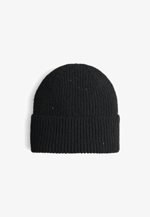 Bonnet en tricot noir avec une texture côtelée et un revers replié, fabriqué à partir d'un fil épais, présentant de subtils éclats à travers le matériau.