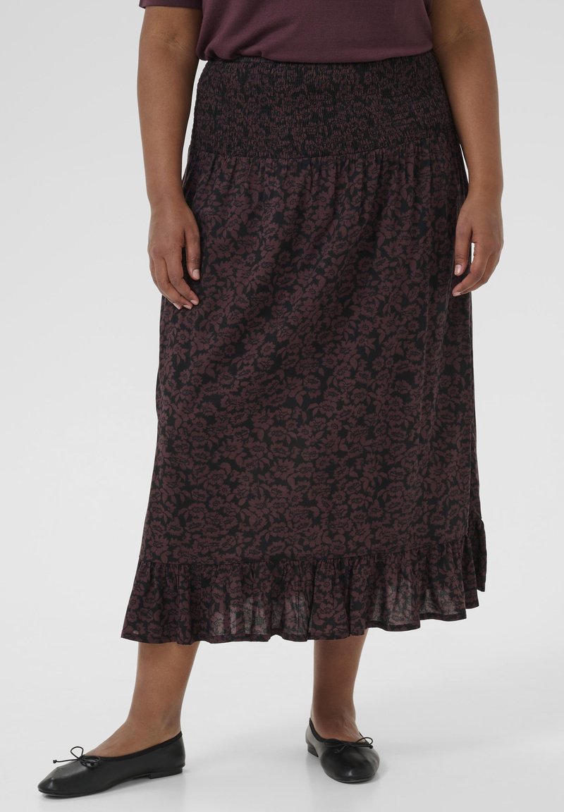 Gonna lunga e scura con stampa floreale, dotata di una vita arricciata e un orlo a balze. Presenta una combinazione di colori nera e bordeaux scuro, realizzata in tessuto leggero.