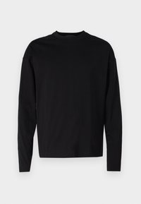 Schwarzes Langarm-T-Shirt aus weicher Baumwolle, mit rundem Halsausschnitt und lockerer Passform, mit klaren Linien und ohne sichtbare Muster oder Akzente.