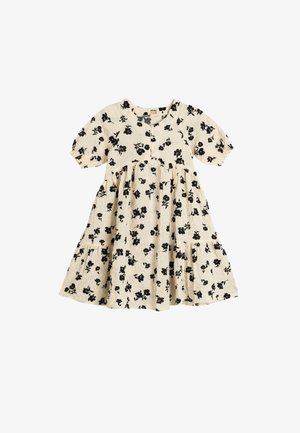 Beige Blümchenkleid mit schwarzem Blumenmuster, kurzen Puffärmeln, Knopfverschluss und gerafftem Rock mit Taschen. Aus Baumwollmaterial.