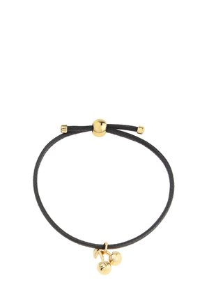 Braccialetto in corda nera intrecciata con un charm in metallo dorato che presenta due piccole campane arrotondate. Chiusura regolabile con scorrimento e dettagli dorati.