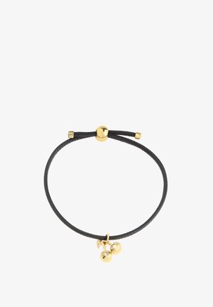 Zwarte gevlochten koord armband met een gouden metalen charm met daarop twee kleine ronde bellen. Verstelbare schuifsluiting met gouden accenten.