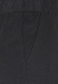mbyM ANJELICA-M - Hlače - black
