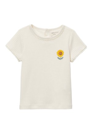 T-shirt bébé côtelé à manches courtes couleur crème avec bords festonnés et petite broderie de tournesol sur la poitrine.